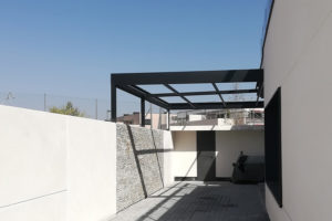 Imagen de una terraza de marquesina minimalista